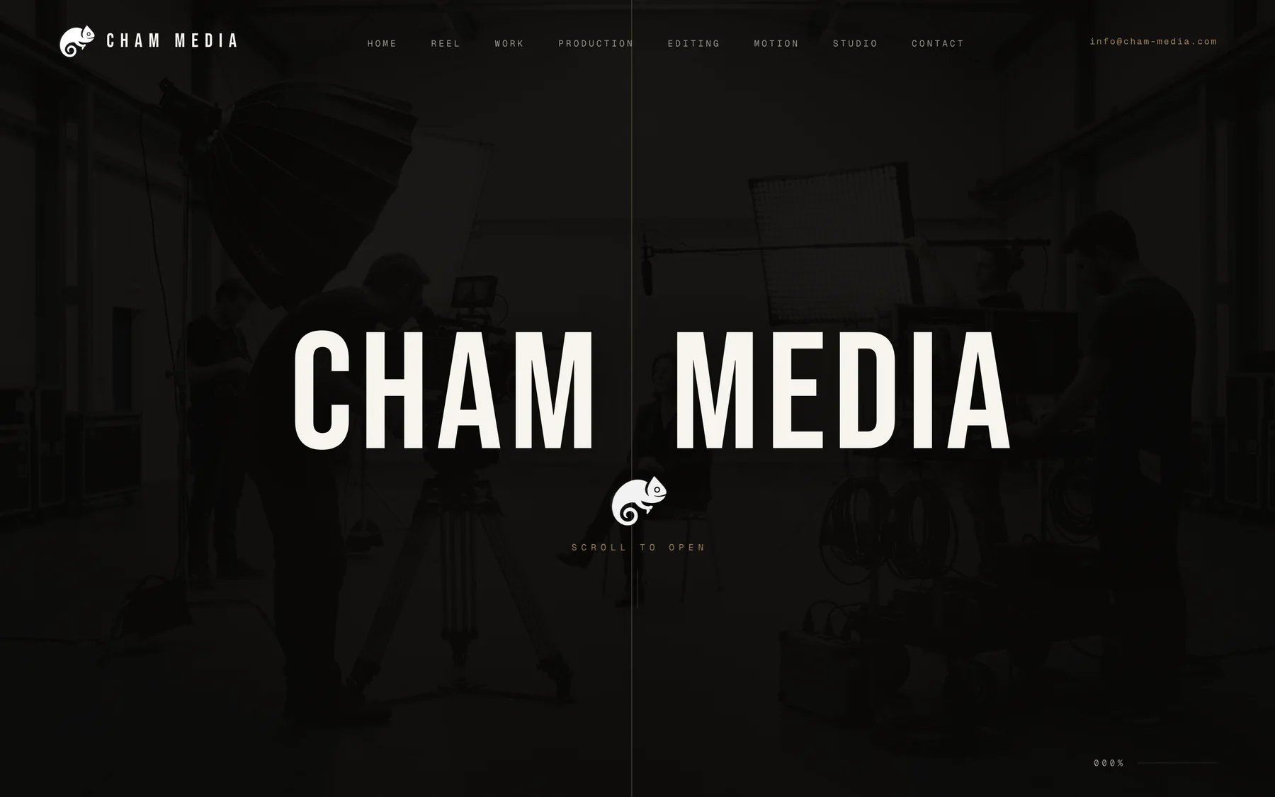 Cham Media website homepage with oversized condensed wordmark over a darkened production still